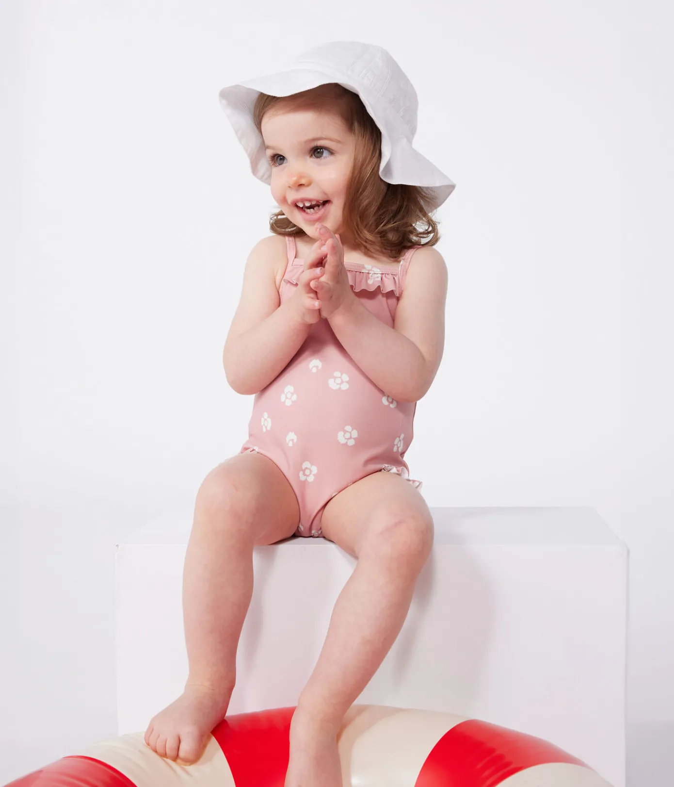 Petit Bateau Bademode, Uv-Kleidung*Einteiliger Baby-Badeanzug mit Rüschen und Blumenmuster rosa CHARME/weiss MARSHMALLOW